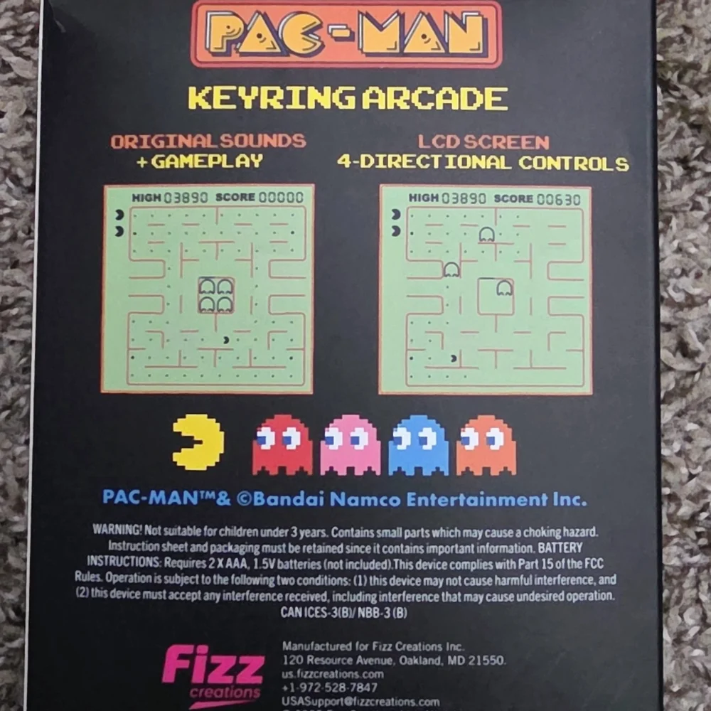 Pac-Man Yellow Handheld Electronic Game -